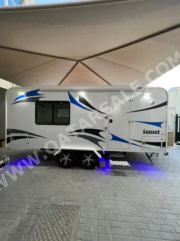 Caravan - 2023  - White  -Made in Qatar  - 0 Km