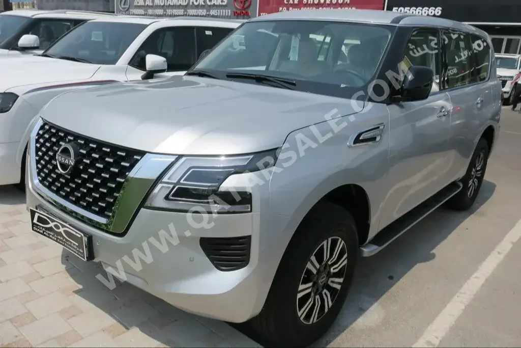 Nissan  Patrol  XE  2023  Automatic  0 Km  6 Cylinder  Four Wheel Drive (4WD)  SUV  Silver  With Warranty