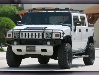 Hummer  H2  2006  Automatic  115,000 Km  8 Cylinder  Four Wheel Drive (4WD)  SUV  White