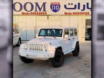 Jeep  Wrangler  Sahara  2014  Automatic  112,000 Km  6 Cylinder  Four Wheel Drive (4WD)  SUV  White
