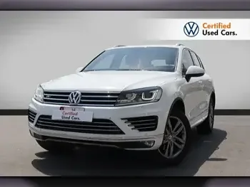 Volkswagen  Touareg  R line  2017  Automatic  65,000 Km  6 Cylinder  All Wheel Drive (AWD)  SUV  White  With Warranty