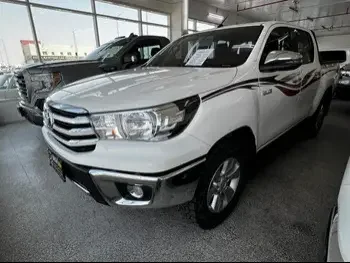Toyota  Hilux  SR5  2020  Automatic  60,000 Km  4 Cylinder  Four Wheel Drive (4WD)  Pick Up  White  With Warranty