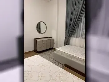 2 Bedrooms  Apartment  For Rent  in Doha -  The Pearl  Fully Furnished