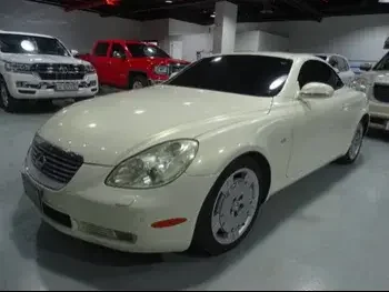 Lexus  SC  430  2003  Automatic  128,000 Km  8 Cylinder  Rear Wheel Drive (RWD)  Coupe / Sport  White  With Warranty