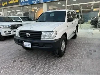  Toyota  Land Cruiser  G  2006  Manual  62,000 Km  6 Cylinder  Four Wheel Drive (4WD)  SUV  White  With Warranty