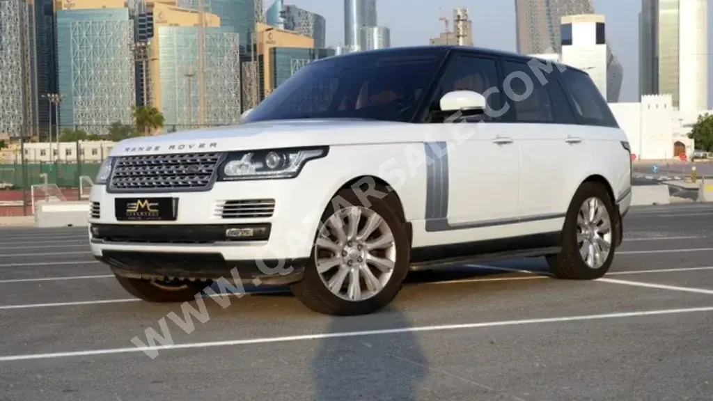 Land Rover  Range Rover  Vogue SE Super charged  2015  Automatic  86,000 Km  8 Cylinder  Four Wheel Drive (4WD)  SUV  White