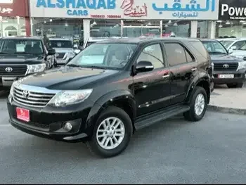 Toyota  Fortuner  2015  Automatic  145,000 Km  4 Cylinder  Four Wheel Drive (4WD)  SUV  Black  With Warranty