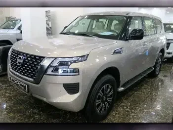 Nissan  Patrol  XE  2023  Automatic  0 Km  6 Cylinder  Four Wheel Drive (4WD)  SUV  Gold  With Warranty