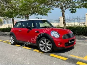 Mini  Cooper  2013  Automatic  50,000 Km  4 Cylinder  Front Wheel Drive (FWD)  Hatchback  Red  With Warranty