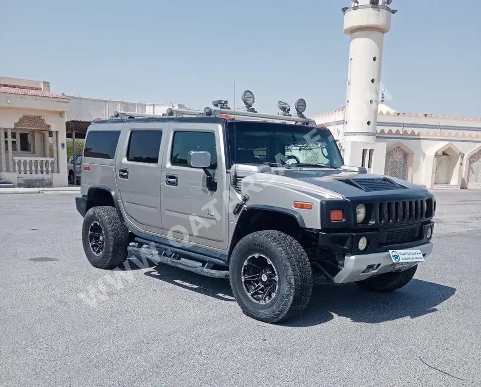 Hummer  H2  2004  Automatic  74,000 Km  8 Cylinder  Four Wheel Drive (4WD)  SUV  Silver  With Warranty