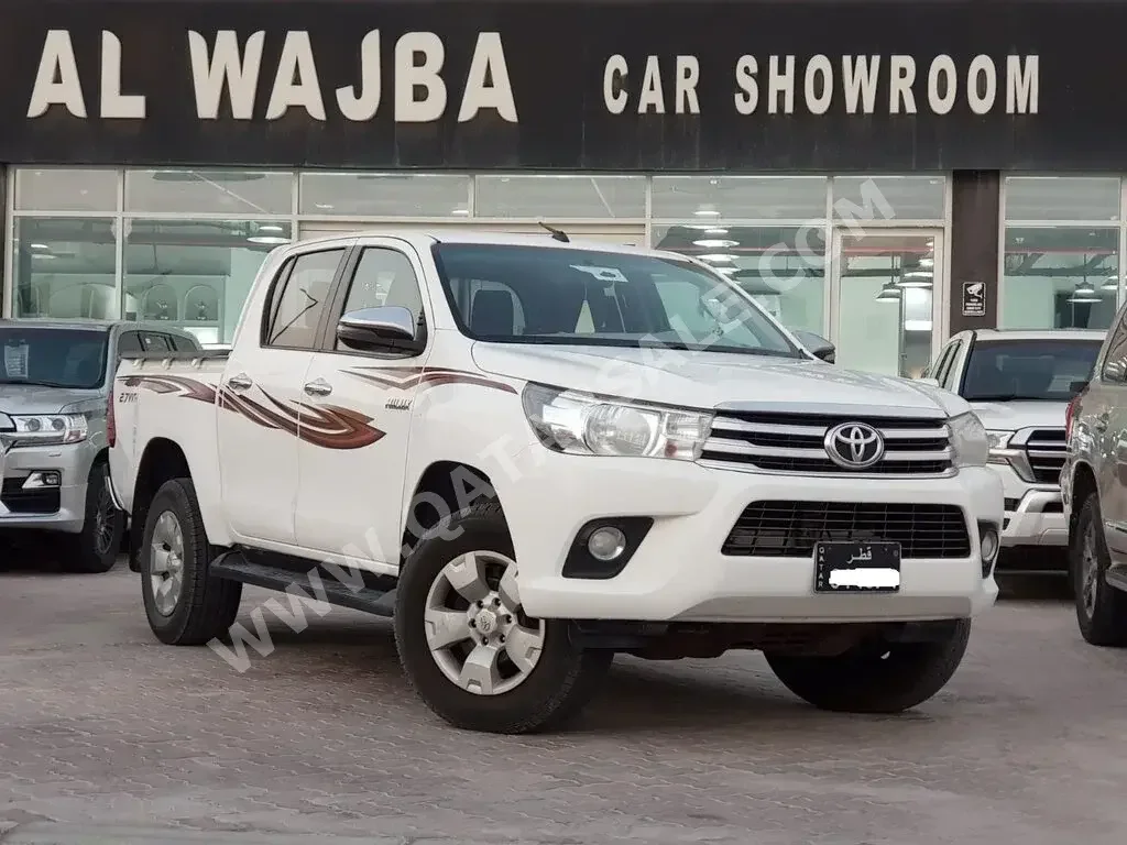 Toyota  Hilux  2018  Manual  180,000 Km  4 Cylinder  Four Wheel Drive (4WD)  Pick Up  White  With Warranty
