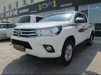 Toyota  Hilux  SR5  2018  Automatic  170,000 Km  4 Cylinder  Four Wheel Drive (4WD)  Pick Up  White  With Warranty