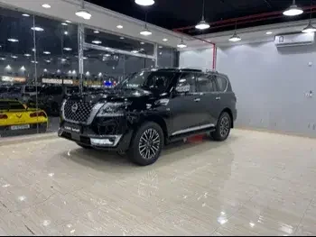 Nissan  Patrol  Platinum  2022  Automatic  9,000 Km  6 Cylinder  Four Wheel Drive (4WD)  SUV  Black  With Warranty
