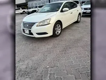 Nissan  Sentra  2013  Automatic  144,000 Km  4 Cylinder  Front Wheel Drive (FWD)  Sedan  White  With Warranty