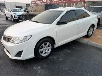 Toyota  Camry  GL  2013  Automatic  165,000 Km  4 Cylinder  Front Wheel Drive (FWD)  Sedan  White  With Warranty