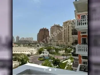 1 غرف نوم  شقة فندق  للايجار  في الدوحة -  اللؤلؤة  نصف مفروشة