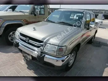 Toyota  Hilux  2003  Manual  148,000 Km  4 Cylinder  Four Wheel Drive (4WD)  Pick Up  Gray