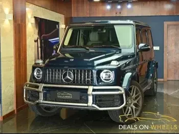 Mercedes-Benz  G-Class  63 AMG  2020  Automatic  51,900 Km  8 Cylinder  Four Wheel Drive (4WD)  SUV  Green and Beige  With Warranty