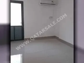 Labour Camp 2 Bedrooms  Apartment  For Rent  in Doha -  Fereej New Al Hitmi  Not Furnished