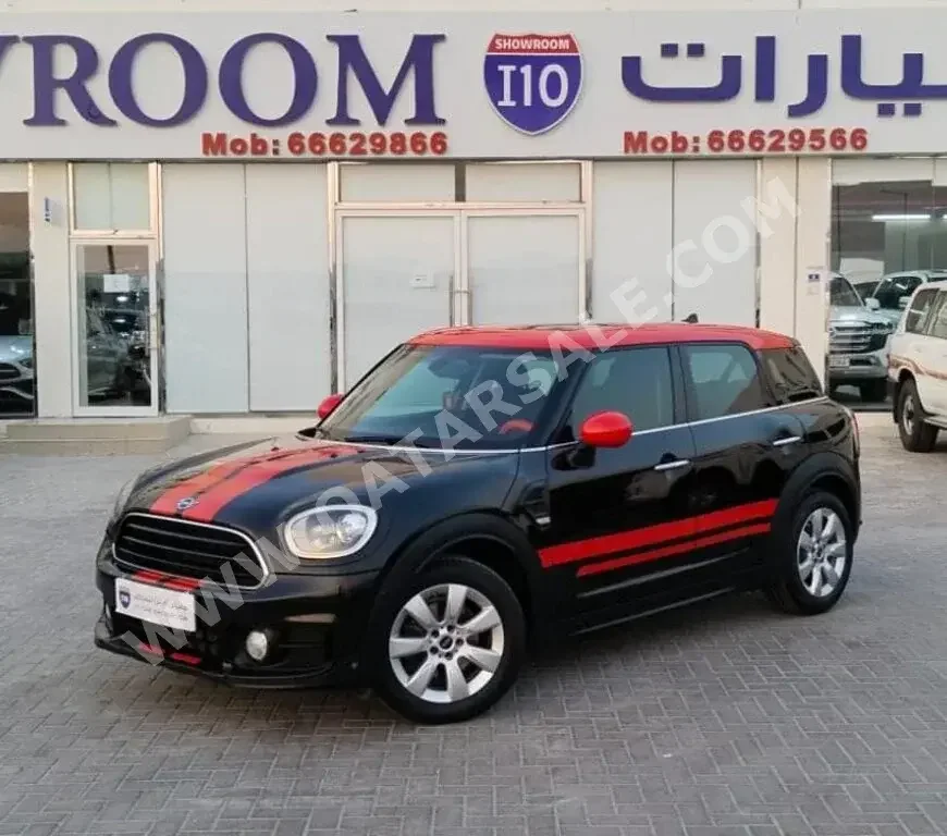 Mini  Cooper  CountryMan  2018  Automatic  94,000 Km  3 Cylinder  Rear Wheel Drive (RWD)  Hatchback  Black and Red