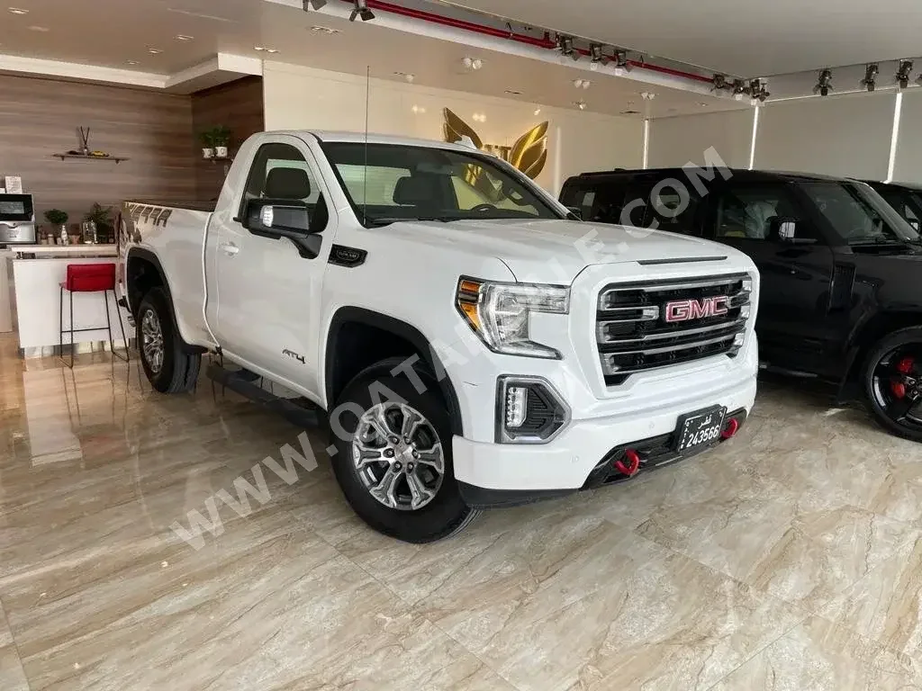 GMC  Sierra  AT4  2019  Automatic  73,000 Km  8 Cylinder  Four Wheel Drive (4WD)  Pick Up  White  With Warranty