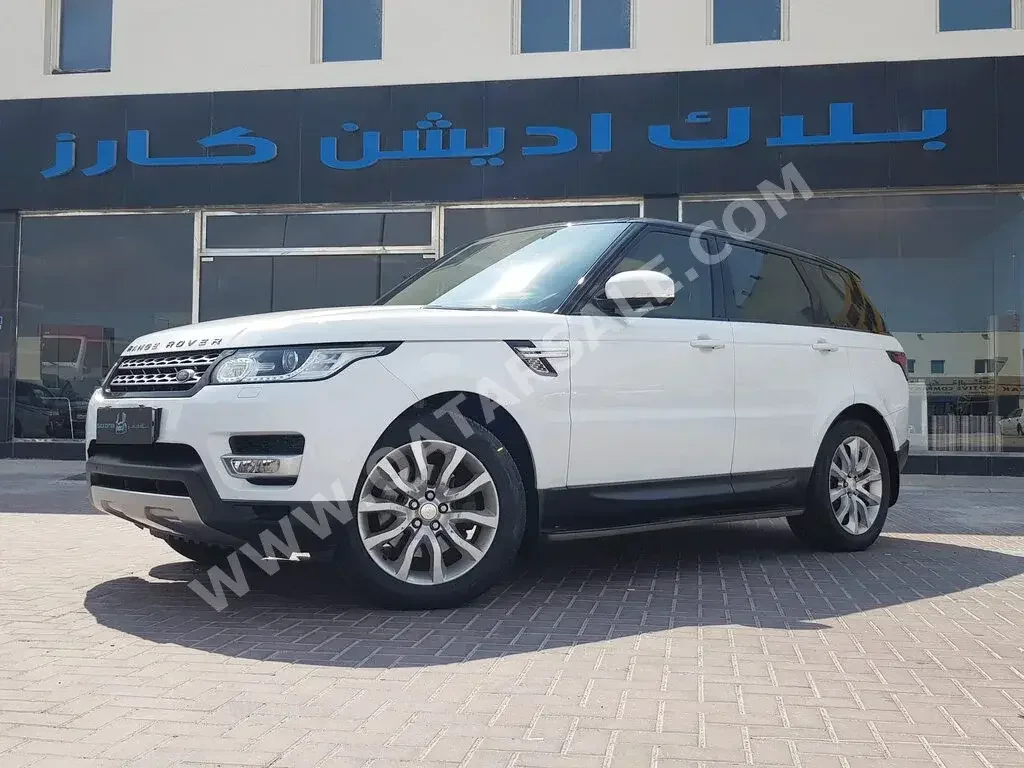 Land Rover  Range Rover  Sport HSE  2014  Automatic  164,000 Km  6 Cylinder  Four Wheel Drive (4WD)  SUV  White
