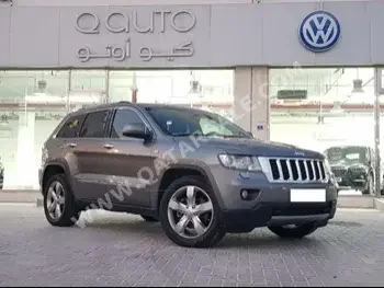Jeep  Grand Cherokee  Limited  2013  Automatic  87,000 Km  6 Cylinder  Four Wheel Drive (4WD)  SUV  Gray