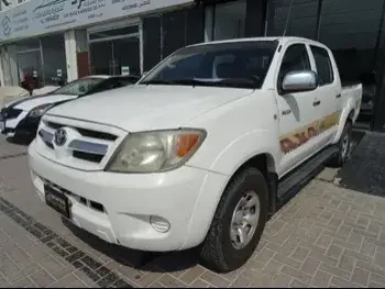 Toyota  Hilux  SR5  2008  Automatic  355,000 Km  4 Cylinder  Four Wheel Drive (4WD)  Pick Up  White