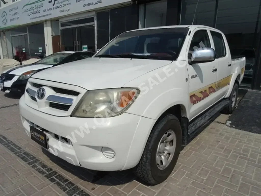 Toyota  Hilux  SR5  2008  Automatic  355,000 Km  4 Cylinder  Four Wheel Drive (4WD)  Pick Up  White