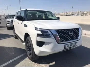  Nissan  Patrol  XE  2023  Automatic  0 Km  6 Cylinder  Four Wheel Drive (4WD)  SUV  White  With Warranty