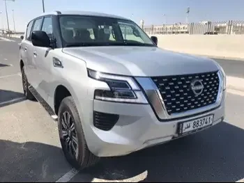  Nissan  Patrol  XE  2023  Automatic  0 Km  6 Cylinder  Four Wheel Drive (4WD)  SUV  Silver  With Warranty