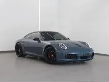 Porsche  911  Carrera S  2017  Automatic  73,500 Km  6 Cylinder  Rear Wheel Drive (RWD)  Coupe / Sport  Gray  With Warranty