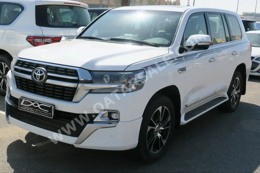 Toyota  Land Cruiser  GXR- Grand Touring  2021  Automatic  114,000 Km  8 Cylinder  Four Wheel Drive (4WD)  SUV  White