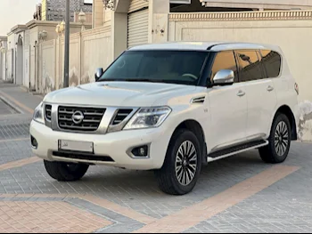 Nissan  Patrol  LE  2015  Automatic  271,000 Km  8 Cylinder  Four Wheel Drive (4WD)  SUV  White