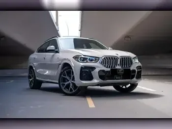 BMW  X-Series  X6  2020  Automatic  85,000 Km  6 Cylinder  Four Wheel Drive (4WD)  SUV  White  With Warranty