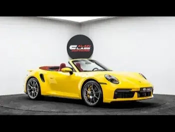 Porsche  911  Turbo S  2023  Automatic  0 Km  6 Cylinder  Rear Wheel Drive (RWD)  Convertible  Yellow  With Warranty