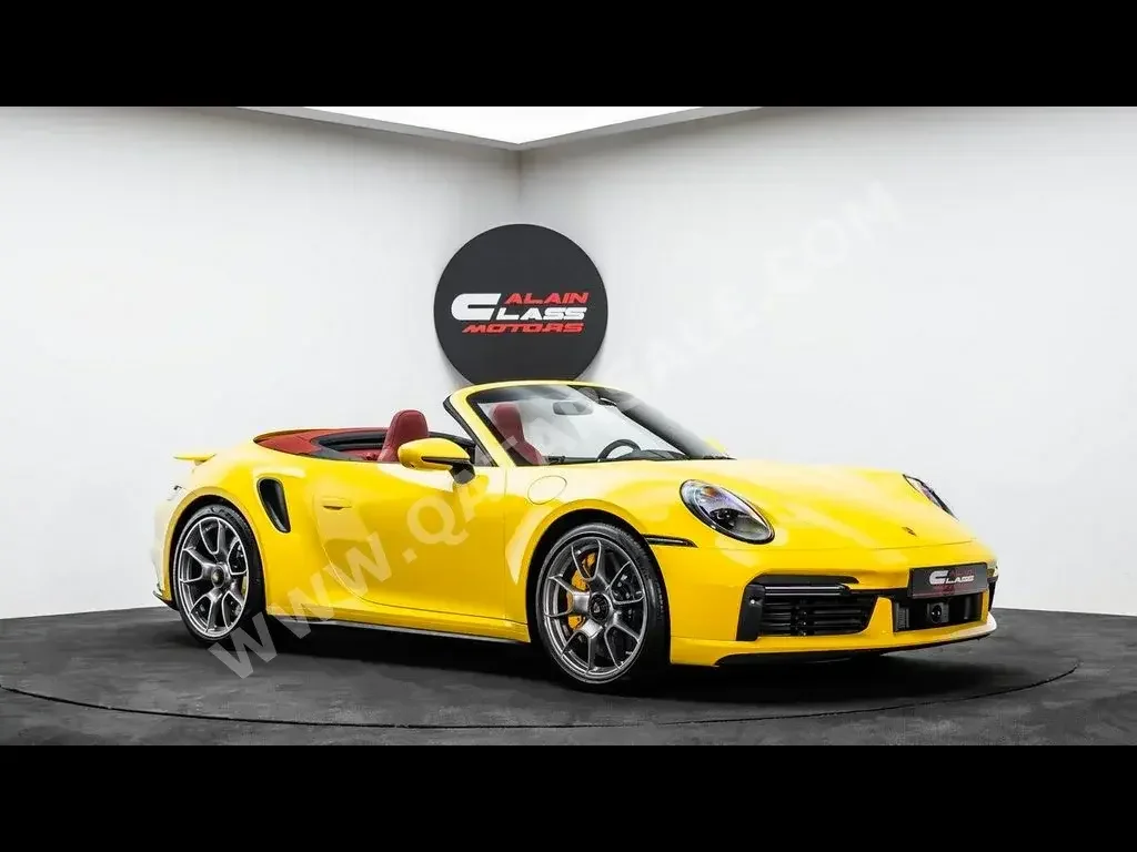 Porsche  911  Turbo S  2023  Automatic  0 Km  6 Cylinder  Rear Wheel Drive (RWD)  Convertible  Yellow  With Warranty
