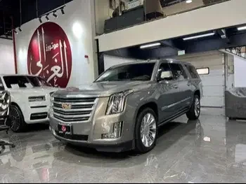  Cadillac  Escalade  Platinum  2018  Automatic  146,000 Km  8 Cylinder  Four Wheel Drive (4WD)  SUV  Brown  With Warranty