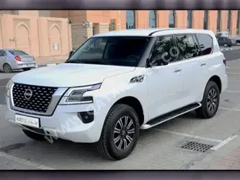 Nissan  Patrol  XE  2022  Automatic  22,000 Km  6 Cylinder  Four Wheel Drive (4WD)  SUV  White  With Warranty