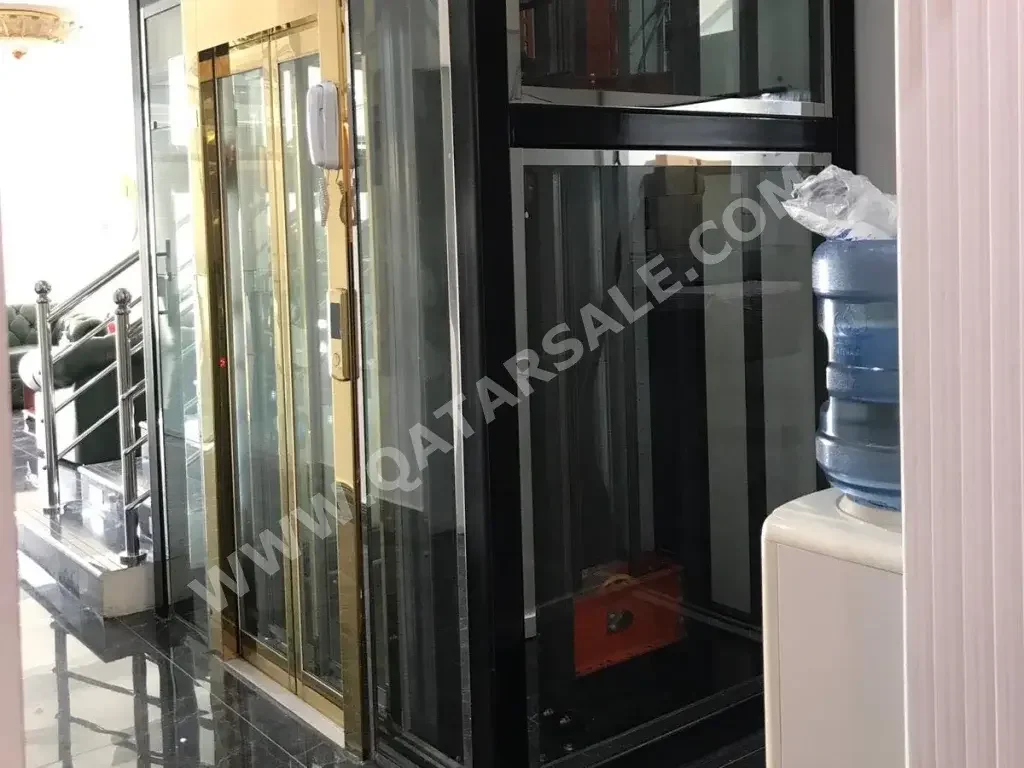 Elevators Ozbesler  6  Golden  1  3  480 Kg \  Hydraulic Elevator  13 m2