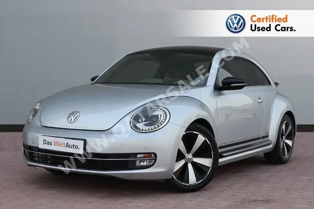 Volkswagen  Beetle  Turbo  2016  Automatic  83,000 Km  4 Cylinder  Front Wheel Drive (FWD)  Hatchback  Silver