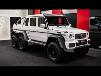 Mercedes-Benz  G-Class  63 AMG  2014  Automatic  0 Km  8 Cylinder  Four Wheel Drive (4WD)  SUV  White  With Warranty