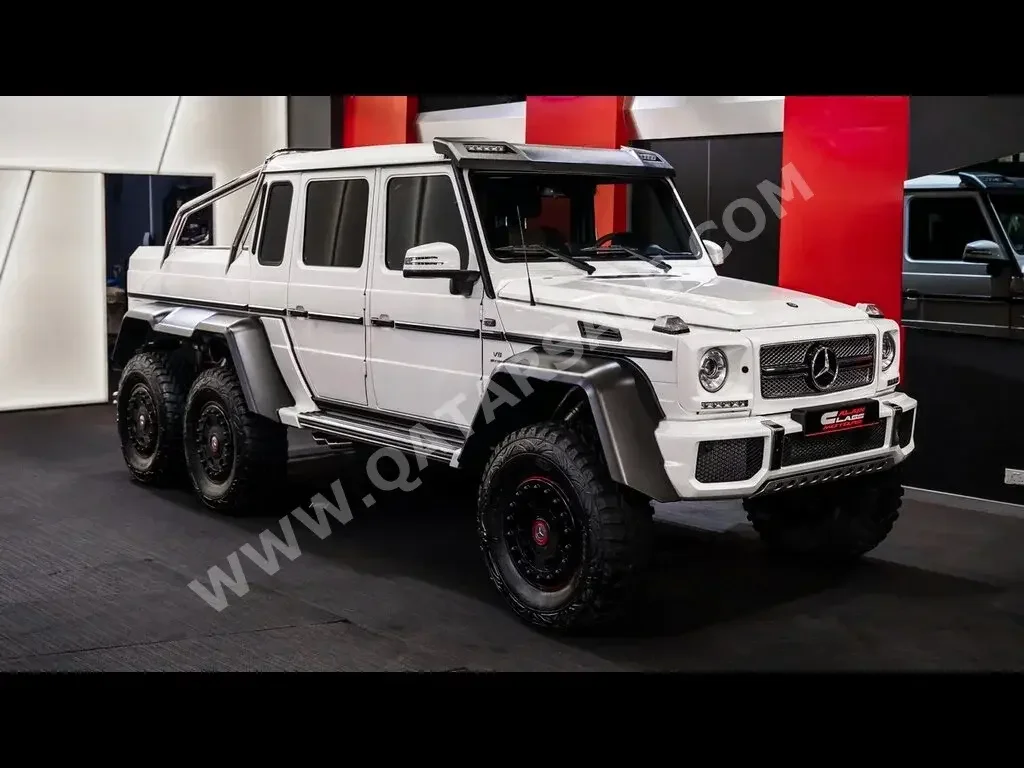 Mercedes-Benz  G-Class  63 AMG  2014  Automatic  0 Km  8 Cylinder  Four Wheel Drive (4WD)  SUV  White  With Warranty