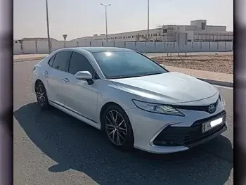 Toyota  Camry  GLX  2023  Automatic  24,000 Km  6 Cylinder  Front Wheel Drive (FWD)  Sedan  White  With Warranty