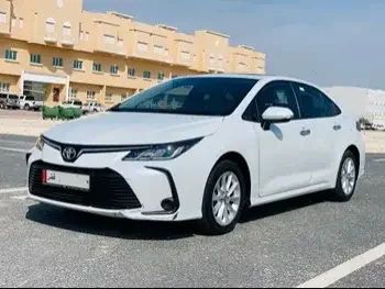 Toyota  Corolla  2022  Automatic  38,000 Km  4 Cylinder  Front Wheel Drive (FWD)  Sedan  White  With Warranty