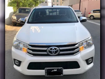 Toyota  Hilux  2021  Automatic  5,800 Km  4 Cylinder  Rear Wheel Drive (RWD)  Pick Up  White  With Warranty