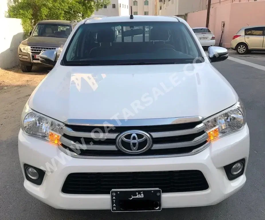 Toyota  Hilux  2021  Automatic  5,800 Km  4 Cylinder  Rear Wheel Drive (RWD)  Pick Up  White  With Warranty