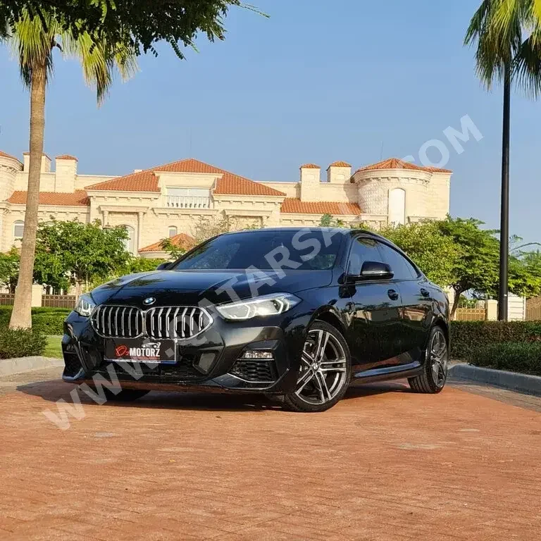  BMW  2-Series  218i  2021  Automatic  35,000 Km  4 Cylinder  Front Wheel Drive (FWD)  Sedan  Black  With Warranty