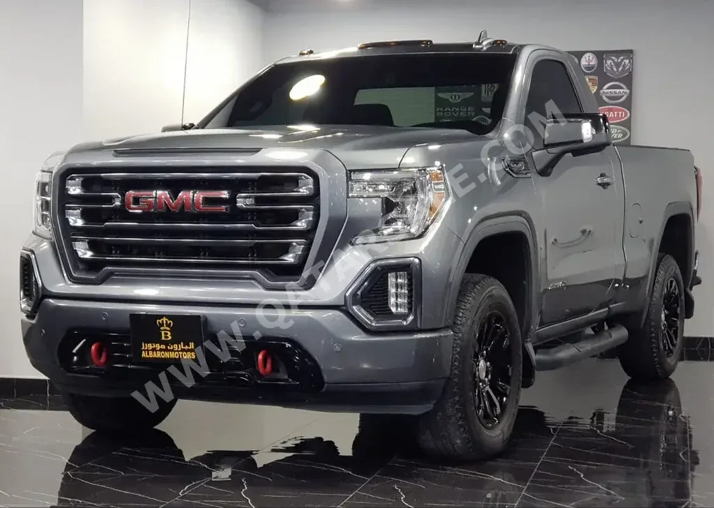 GMC  Sierra  AT4  2019  Automatic  95,000 Km  8 Cylinder  Four Wheel Drive (4WD)  Pick Up  Gray