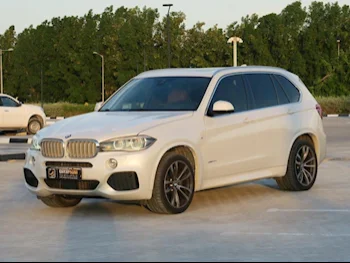 BMW  X-Series  X5 M  2014  Automatic  138,000 Km  8 Cylinder  Four Wheel Drive (4WD)  SUV  White